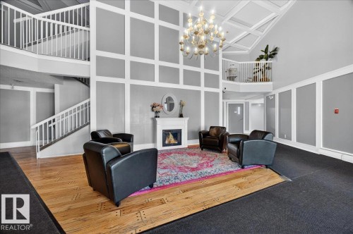 #406 5125 Riverbend Rd Nw, Edmonton, AB - Indoor With Fireplace