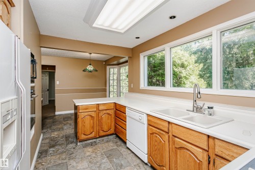 Rural Strathcona County, AB - Indoor Photo Showing Kitchen With Double Sink