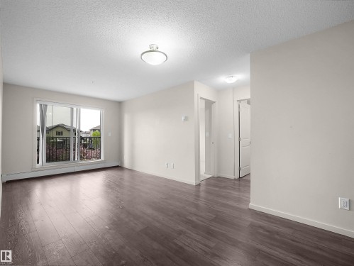 215 3357 16A Avenue, Edmonton, AB - Indoor Photo Showing Living Room