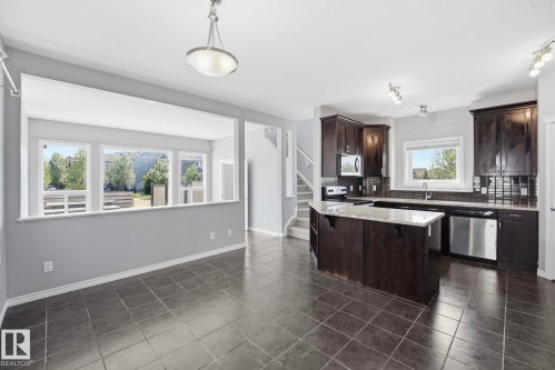 7043 22 Avenue Sw, Edmonton, AB - Indoor Photo Showing Kitchen With Double Sink