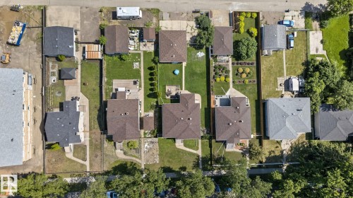 Aerial perspective showcasing multiple residential properties with varied rooflines and landscaping - 12229 88 Street Nw, Edmonton, AB - Other