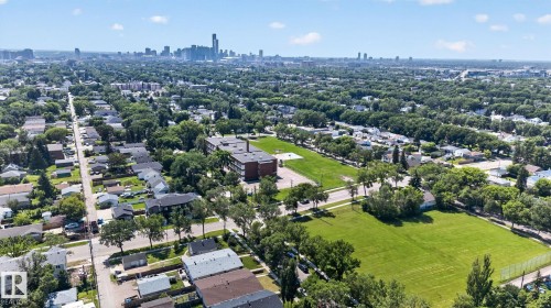 Expansive residential area featuring numerous detached homes and abundant mature trees - 12229 88 Street Nw, Edmonton, AB - Outdoor With View