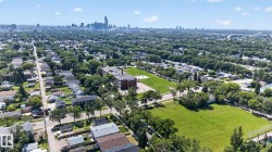 Expansive residential area featuring numerous detached homes and abundant mature trees - 