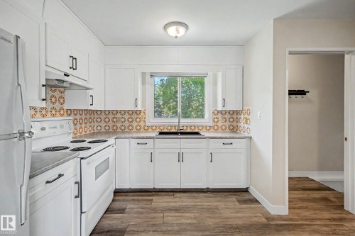 Edmonton, AB - Indoor Photo Showing Kitchen With Double Sink