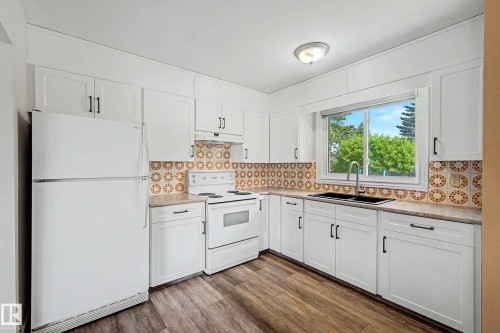 Edmonton, AB - Indoor Photo Showing Kitchen With Double Sink