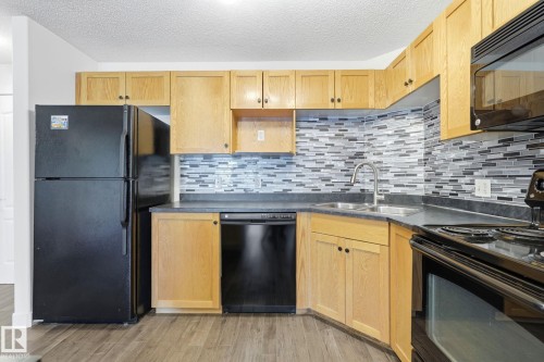 #1102 7339 South Terwillegar Dr Nw, Edmonton, AB - Indoor Photo Showing Kitchen With Double Sink