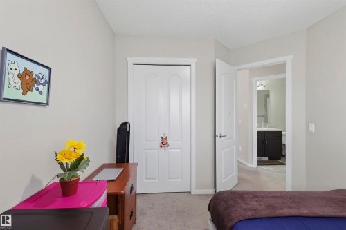 Neutral wall color, white trim, and textured ceiling - 1528 35 Avenue Nw, Edmonton, AB - Indoor Photo Showing Other Room