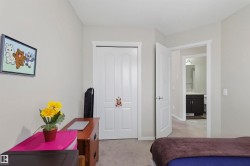 Neutral wall color, white trim, and textured ceiling - 