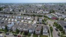 Expansive residential community featuring a variety of detached homes with diverse architectural styles, concrete streets, and mature trees - 1528 35 Avenue Nw, Edmonton, AB  - Outdoor With View 