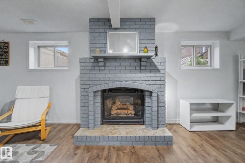 3706 41 Avenue Nw, Edmonton, AB - Indoor Photo Showing Living Room With Fireplace