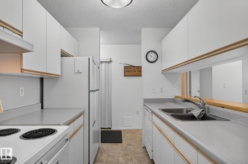 #414 10636 120 St Nw, Edmonton, AB - Indoor Photo Showing Kitchen With Double Sink