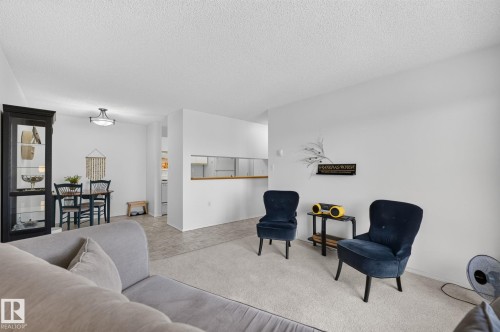 #414 10636 120 St Nw, Edmonton, AB - Indoor Photo Showing Living Room