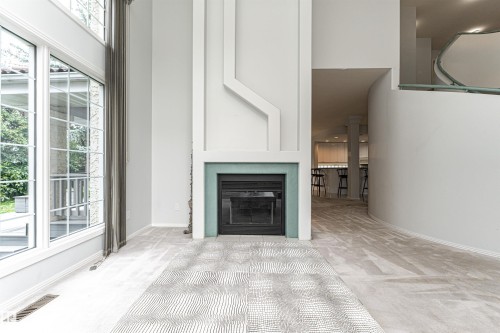 300 Ferris Way Nw, Edmonton, AB - Indoor Photo Showing Other Room With Fireplace