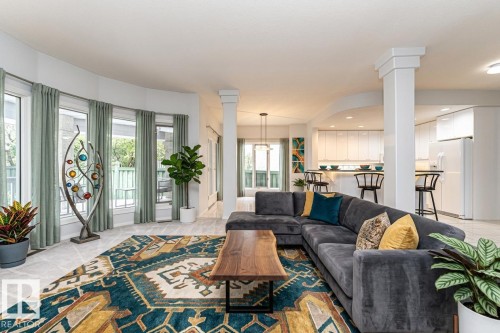 virtually staged - 300 Ferris Way Nw, Edmonton, AB - Indoor Photo Showing Living Room