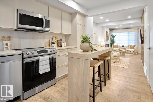 21014 24 Avenue Nw, Edmonton, AB - Indoor Photo Showing Kitchen With Upgraded Kitchen