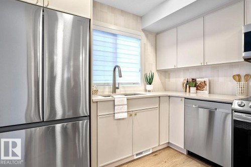 21014 24 Avenue Nw, Edmonton, AB - Indoor Photo Showing Kitchen With Upgraded Kitchen