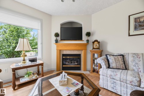 8011 164 Avenue Nw, Edmonton, AB - Indoor Photo Showing Living Room With Fireplace