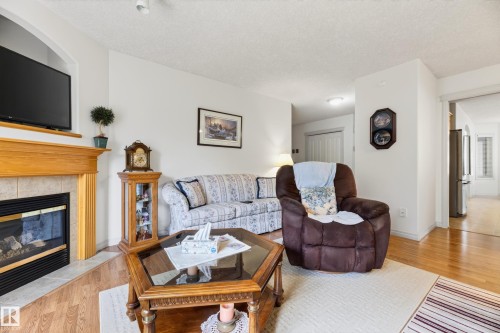 8011 164 Avenue Nw, Edmonton, AB - Indoor Photo Showing Living Room With Fireplace
