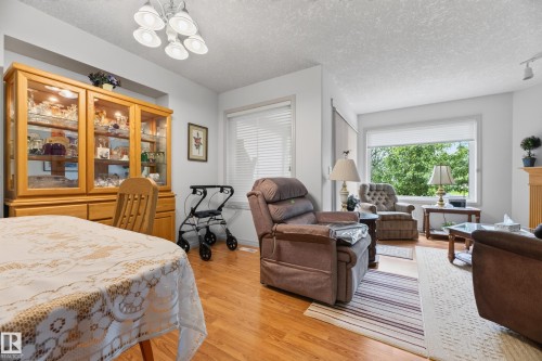 8011 164 Avenue Nw, Edmonton, AB - Indoor Photo Showing Living Room With Fireplace