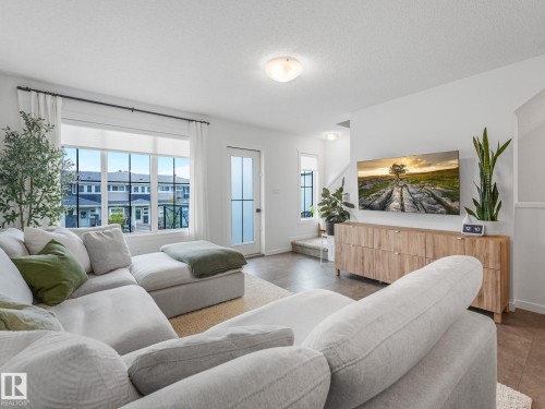 1061 Cy Becker Road Nw, Edmonton, AB - Indoor Photo Showing Living Room