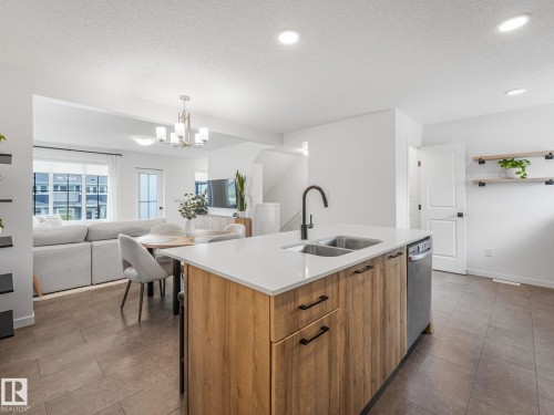 1061 Cy Becker Road Nw, Edmonton, AB - Indoor Photo Showing Kitchen With Double Sink With Upgraded Kitchen