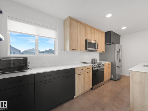 1061 Cy Becker Road Nw, Edmonton, AB - Indoor Photo Showing Kitchen
