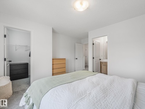1061 Cy Becker Road Nw, Edmonton, AB - Indoor Photo Showing Bedroom