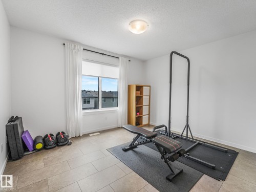 1061 Cy Becker Road Nw, Edmonton, AB - Indoor Photo Showing Gym Room