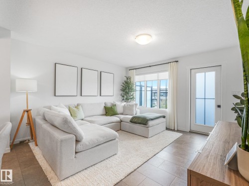 1061 Cy Becker Road Nw, Edmonton, AB - Indoor Photo Showing Living Room