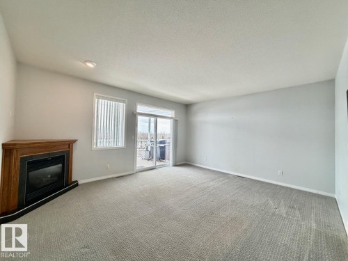 3806 44A Avenue, Drayton Valley, AB - Indoor Photo Showing Other Room With Fireplace