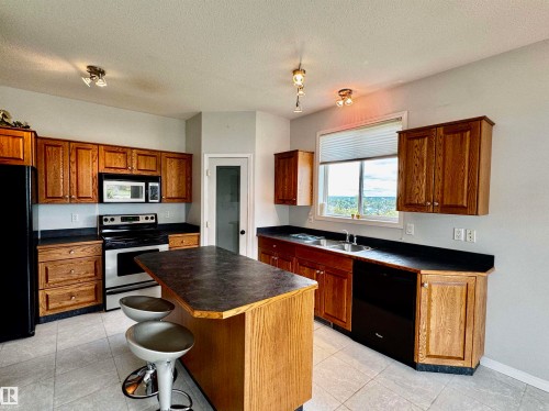 3806 44A Avenue, Drayton Valley, AB - Indoor Photo Showing Kitchen With Double Sink