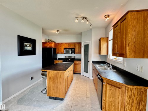 3806 44A Avenue, Drayton Valley, AB - Indoor Photo Showing Kitchen With Double Sink