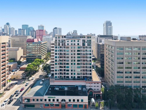 Multi-story building with multiple balconies, surrounded by an urban landscape - #708 9939 109 St Nw, Edmonton, AB - Outdoor With Facade
