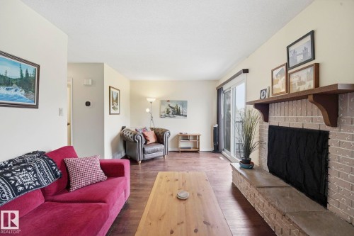 5362 38A Avenue Nw, Edmonton, AB - Indoor Photo Showing Living Room With Fireplace