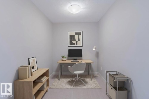 Neutral-toned room featuring light gray walls and a flush-mount ceiling light - 6717 Elston Lane Nw, Edmonton, AB - Indoor Photo Showing Office