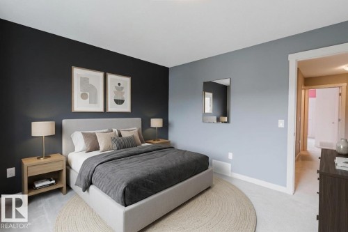 Carpeted bedroom featuring a dark accent wall, light gray walls, white baseboards, and a white ceiling - 6717 Elston Lane Nw, Edmonton, AB - Indoor Photo Showing Bedroom