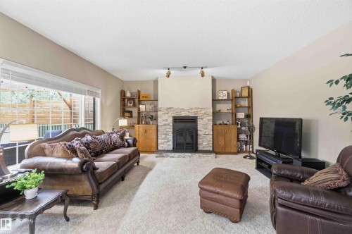 1080 Wedgewood Boulevard Nw, Edmonton, AB - Indoor Photo Showing Living Room With Fireplace