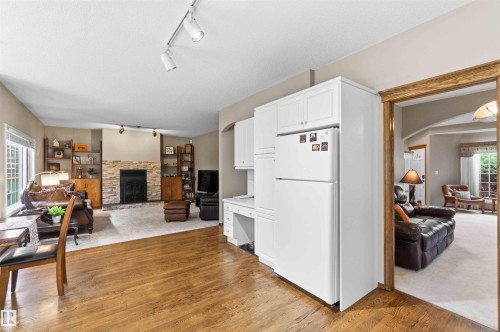1080 Wedgewood Boulevard Nw, Edmonton, AB - Indoor Photo Showing Other Room With Fireplace