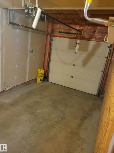 #157 230 Edwards Dr Sw, Edmonton, AB - Indoor Photo Showing Garage