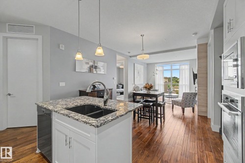 #810 200 Bellerose Dr, St. Albert, AB - Indoor Photo Showing Kitchen With Double Sink With Upgraded Kitchen