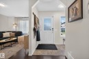 Bright entry with a white paneled door featuring a decorative glass insert - 191 Brookview Place, Stony Plain, AB  - Indoor Photo Showing Other Room 