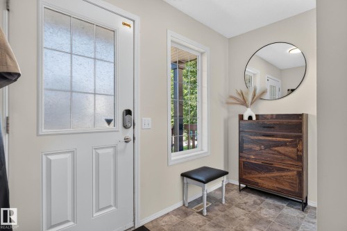 Entryway featuring a white paneled door with frosted lites and a smart lock - 191 Brookview Place, Stony Plain, AB - Indoor Photo Showing Other Room