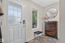 Entryway featuring a white paneled door with frosted lites and a smart lock - 191 Brookview Place, Stony Plain, AB  - Indoor Photo Showing Other Room 