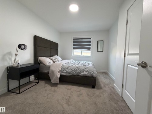 Bedroom - 3631 213 Street Nw, Edmonton, AB - Indoor Photo Showing Bedroom