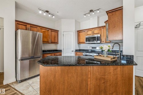 #110 5211 50 St, Stony Plain, AB - Indoor Photo Showing Kitchen With Stainless Steel Kitchen With Double Sink