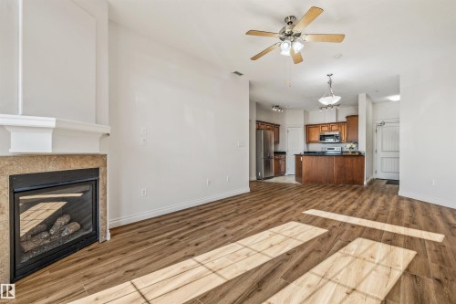 #110 5211 50 St, Stony Plain, AB - Indoor Photo Showing Living Room With Fireplace