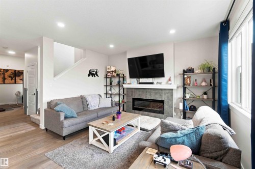 7608 Creighton Place Sw, Edmonton, AB - Indoor Photo Showing Living Room With Fireplace