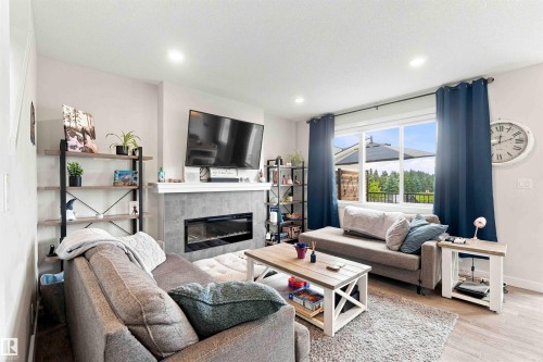 7608 Creighton Place Sw, Edmonton, AB - Indoor Photo Showing Living Room With Fireplace