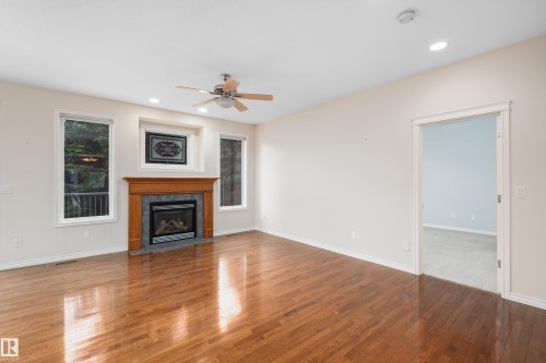#40 1251 Rutherford Rd Sw, Edmonton, AB - Indoor Photo Showing Living Room With Fireplace