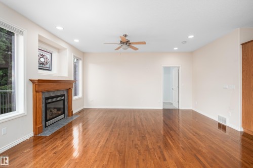 #40 1251 Rutherford Rd Sw, Edmonton, AB - Indoor With Fireplace
